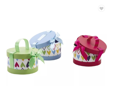 Handmade round paper gift box with ribbon lift